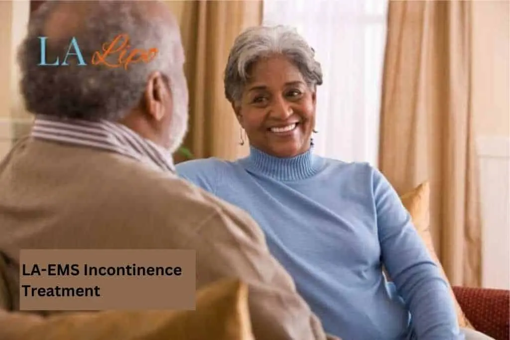 Couple sat smiling at each other - LA-EMS treatment West Brompton