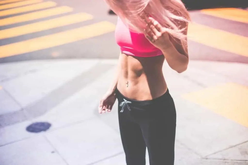 Woman with toned stomach after LA-EMS Body Sculpting Treatment West Brompton