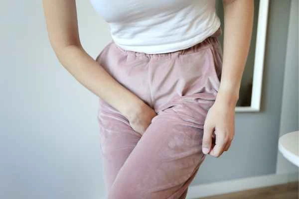 woman running for the toilet because of urinary incontinence West Brompton